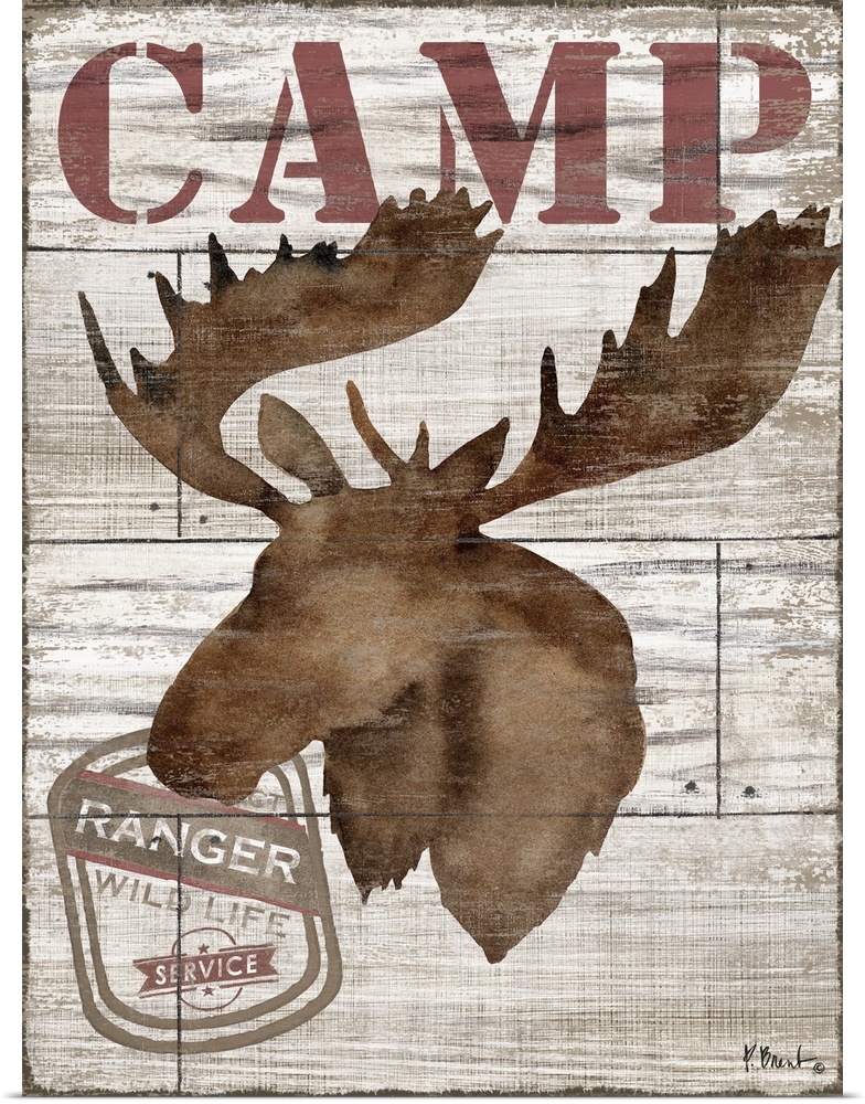 Contemporary decorative artwork of a moose silhouette with the word "camp" on a textured wooden background.