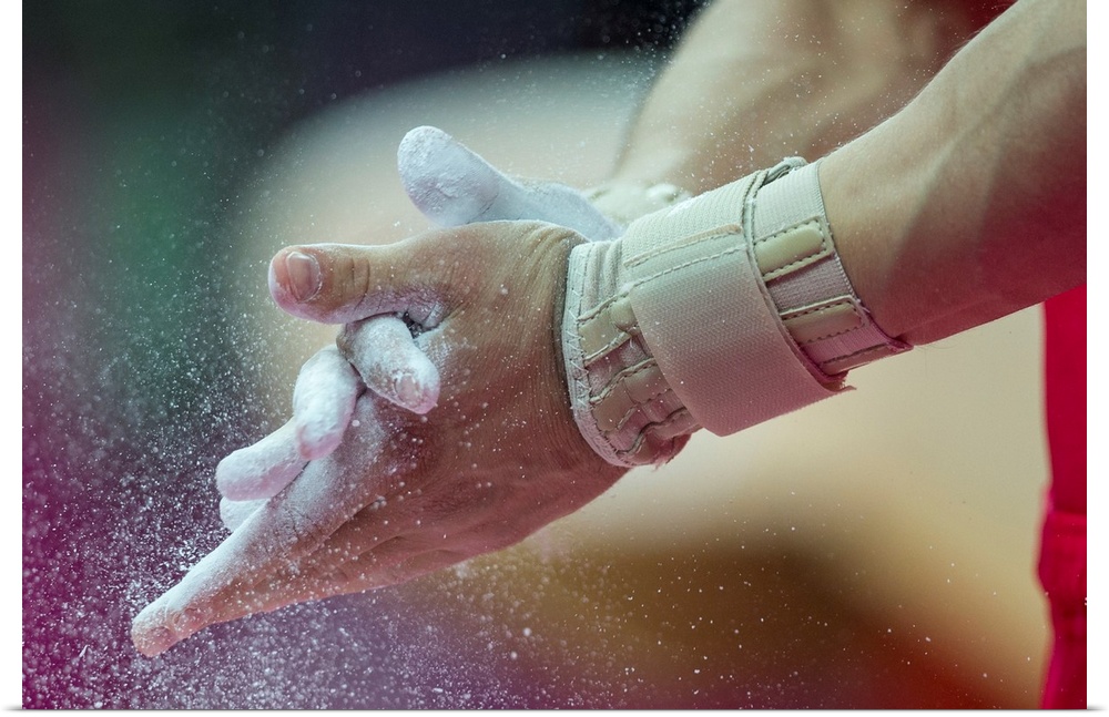 Detail of male gymnasts hands applying chalk during the Men's Gymnastics Individual All-Around at the 2012 Olympic Summer ...