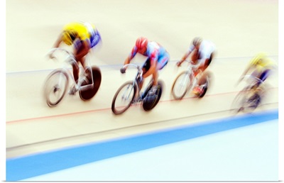 Blurred action of cyclist on the track