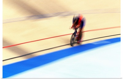 Blurred action of cyclist on the track