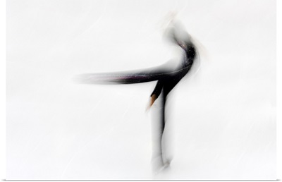 Blurred action of figure skater