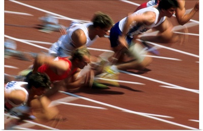 Blurred action of men's 100 meter sprint race