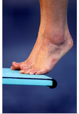 Detail of diver's feet on the diving board