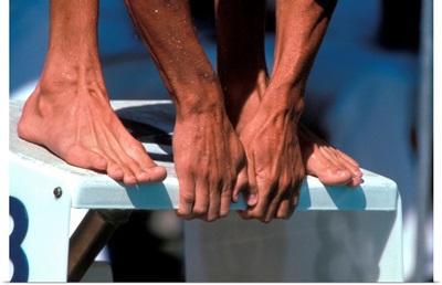 Detail of swimmer at the start of a race
