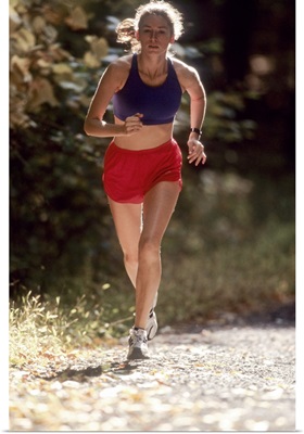Female runner out on the trails