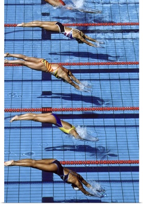 Female swimmers at the start of a race