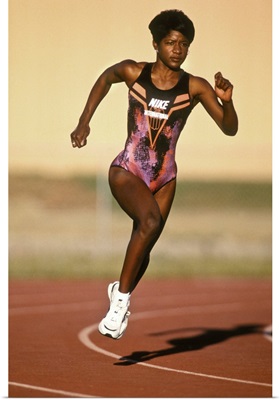 Female track and field athlete in action
