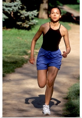 Hispanic woman running for exercise