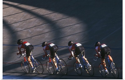 Male cycling team on the velodrome