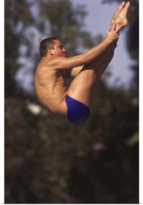 Male diver in the air