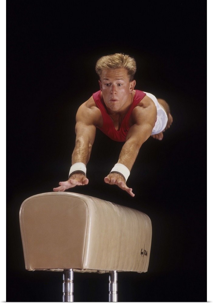 Male gymnast on the vault
