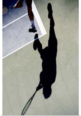 Shadow of tennis player in action