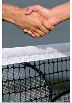 Tennis players' handshake over the net