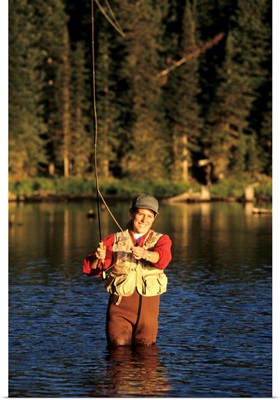 Woman fly fishing