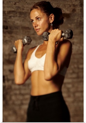 Woman working out with hand weights