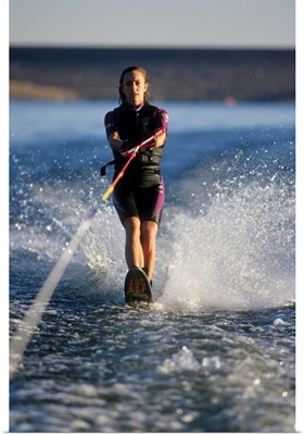 Young female water skier in action