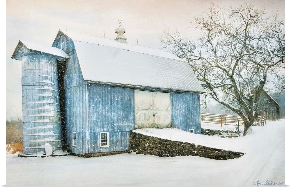 Photograph of a blue barn in rural countryside scene in winter.