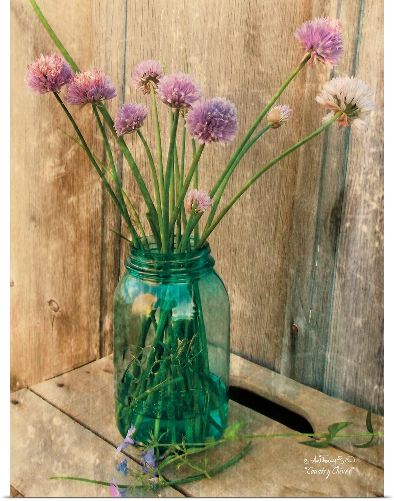 Decorative artwork with a bouquet of purple flowers in a ball mason jar vase over a distressed wood background.