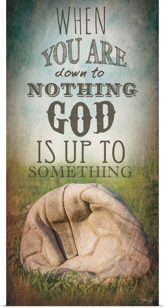 An inspirational religious typography design with a deflated ball.