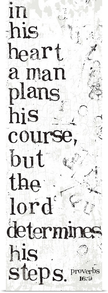 Distressed black and white letter-stamped Bible verse scripture of Proverbs 16:9 In his heart a man plans his course, but ...