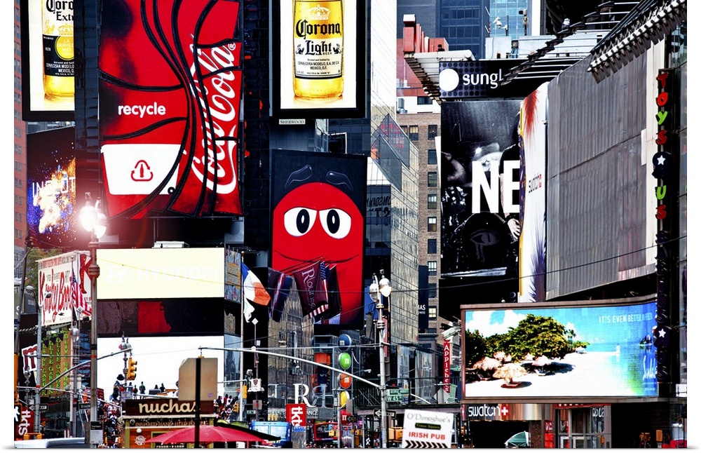 A multitude of branded billboards on the sides of buildings in Times Square.