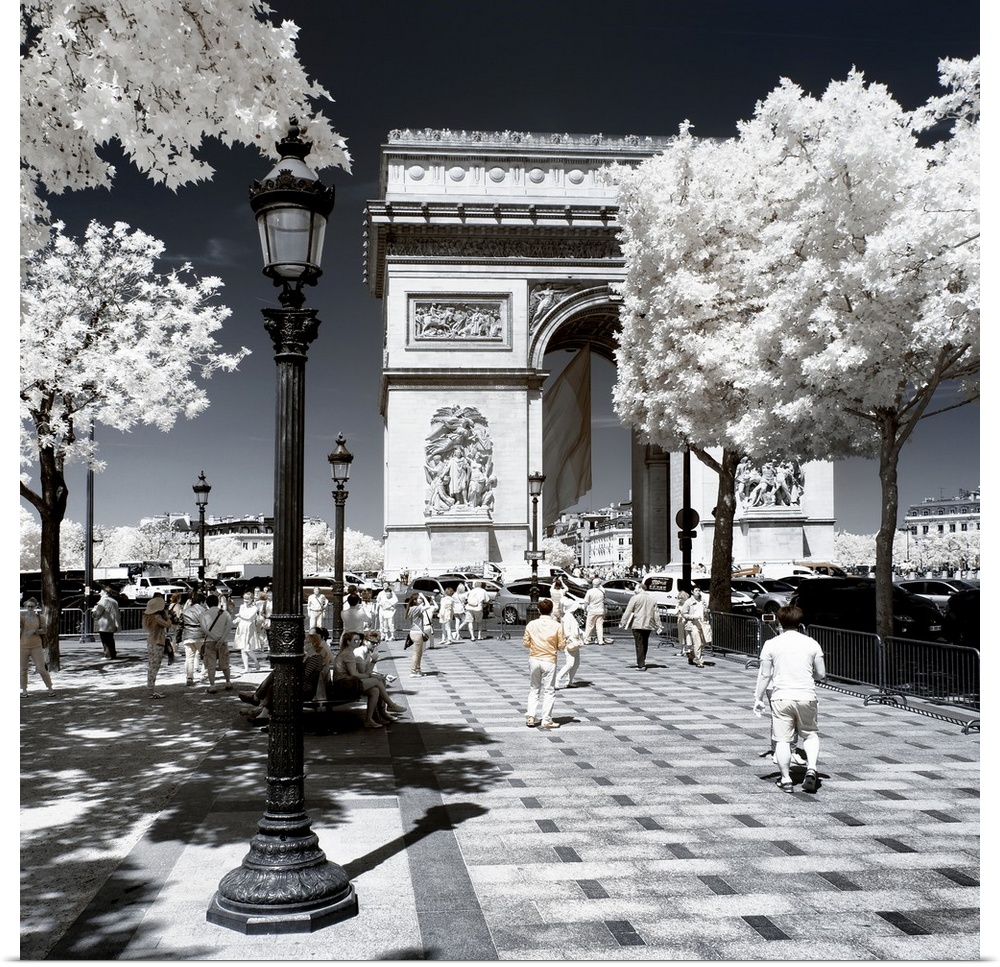 A view of the Arc de Triomphe in Paris, made in infrared mode in summer. The vegetation is white and rendering of the sky ...