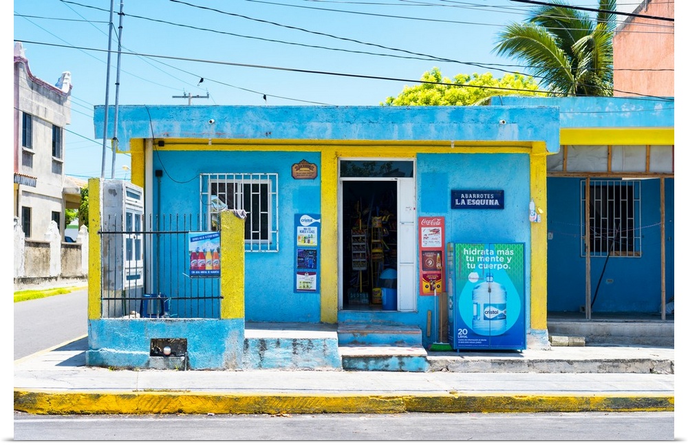 Photograph of a blue and yellow supermarket in Cancun, Mexico. From the Viva Mexico Collection.