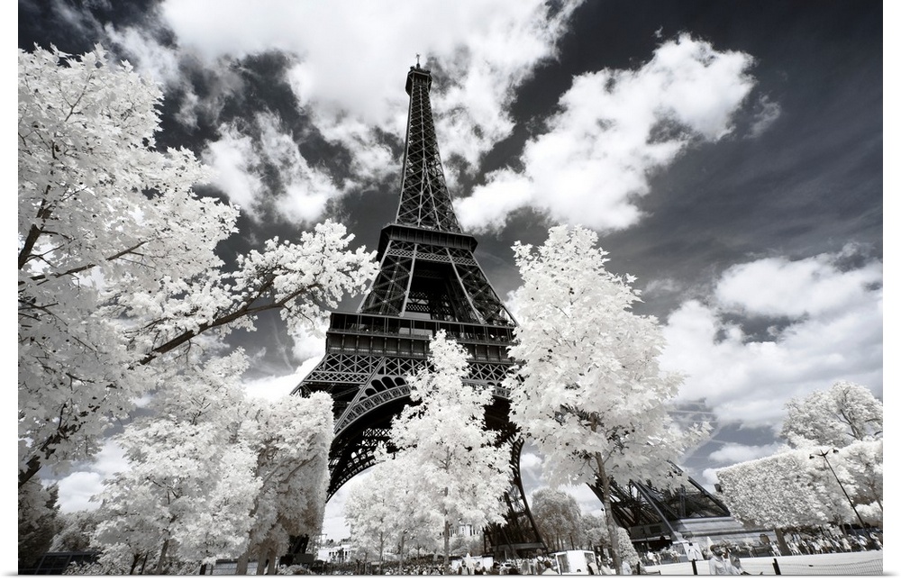 A view of the Eiffel Tower in Paris, made in infrared mode in summer. The vegetation is white and rendering of the sky is ...