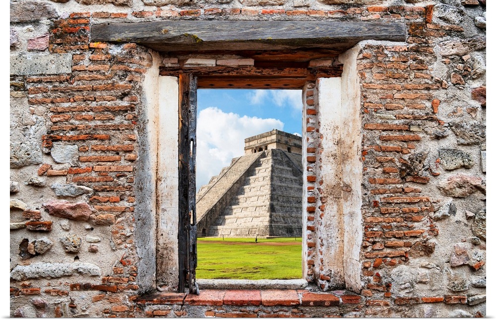 View of El Castillo Pyramid in Yucat?n, Mexico, framed through a stony, brick window. From the Viva Mexico Window View.�