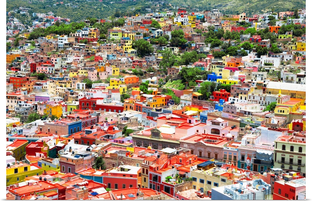 Aerial photograph of the city of Guanajuato, Mexico, with colorful buildings. From the Viva Mexico Collection.