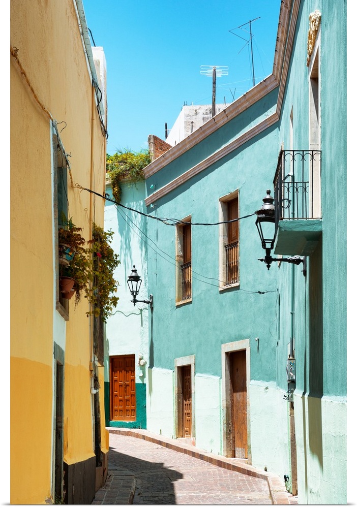 Photograph of a pastel colored streetscape in Guanajuato, Mexico. From the Viva Mexico Collection.