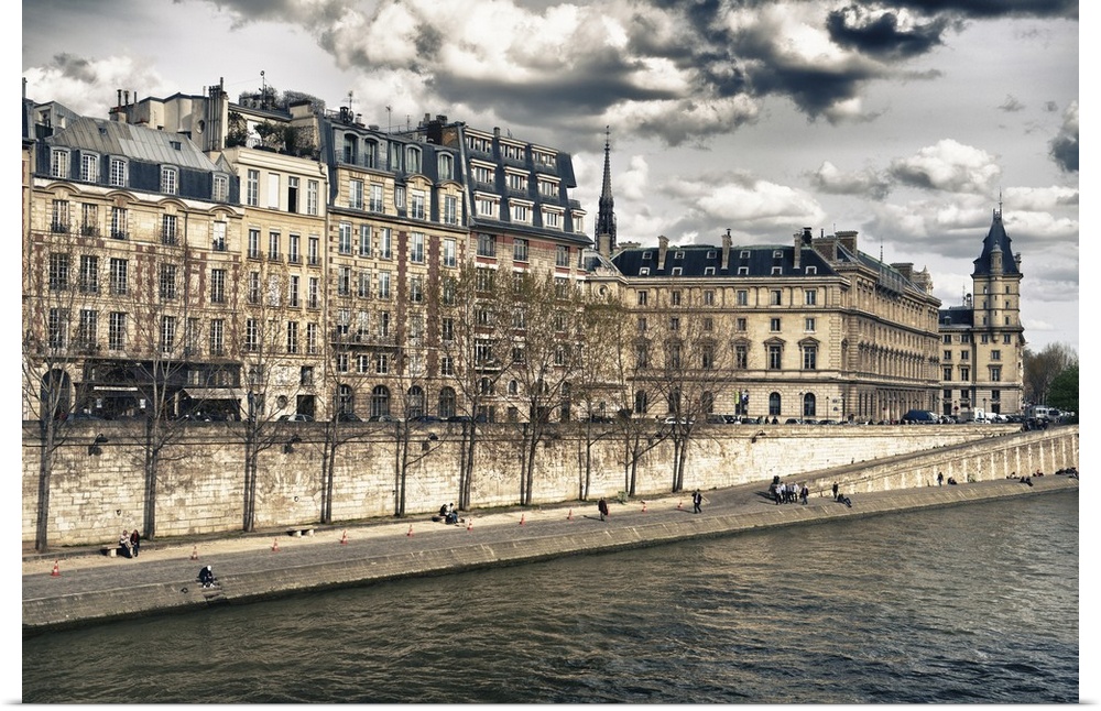 Fine art photo of the buildings in the heart of Paris, surrounded by the Seine river.