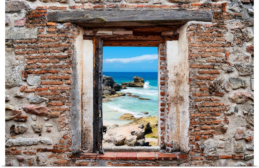 View of the Isla Mujeres coastline framed through a stony, brick window. From the Viva Mexico Window View.