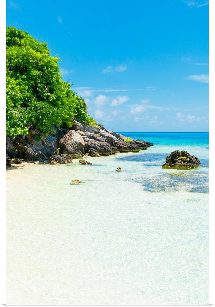 Photograph of a relaxing beach scene in Isla Mujeres, Mexico, with clear blue water. From the Viva Mexico Collection.