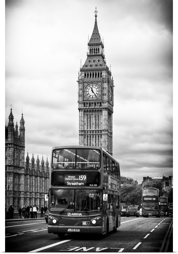 Photograph of the iconic double decker bus driving past Big Ben in London.