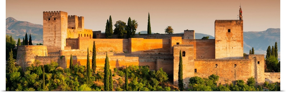 It's a view of the Alhambra of Granada in Andalusia at sunset (Spain).