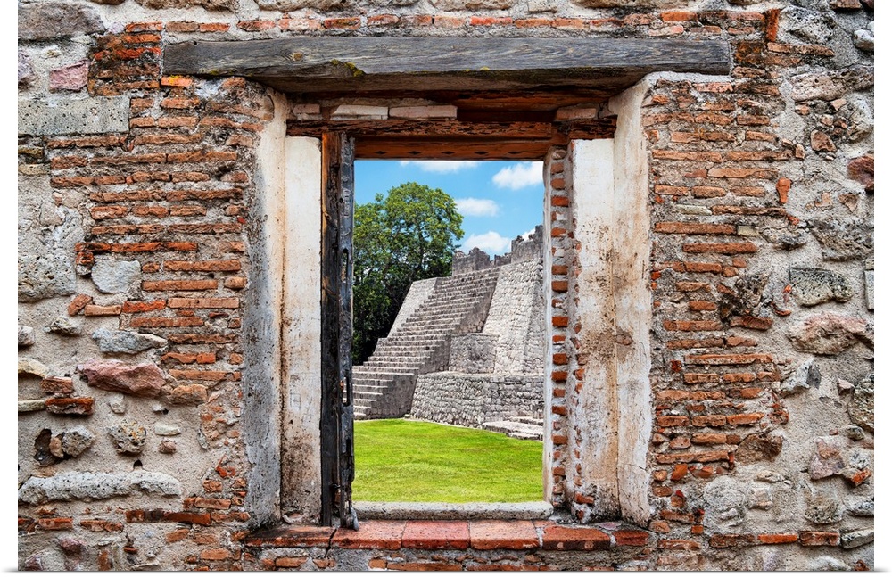 View of a Mayan Pyramid framed through a stony, brick window. From the Viva Mexico Window View.