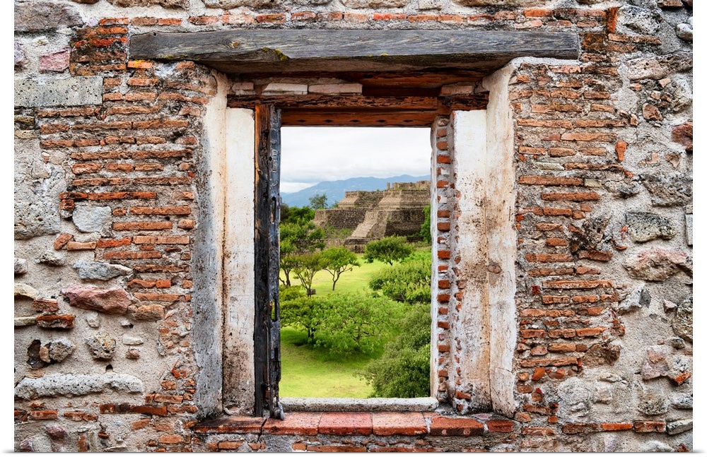 View of the Mayan Temple of Monte Alban framed through a stony, brick window. From the Viva Mexico Window View.