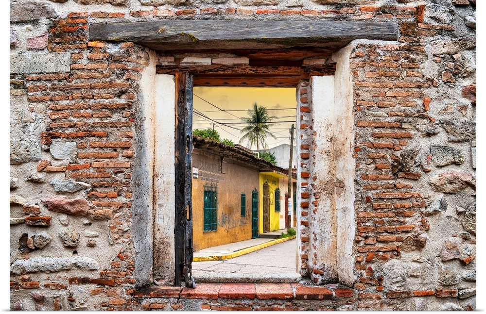 View of a street scene in Mexico framed through a stony, brick window. From the Viva Mexico Window View.