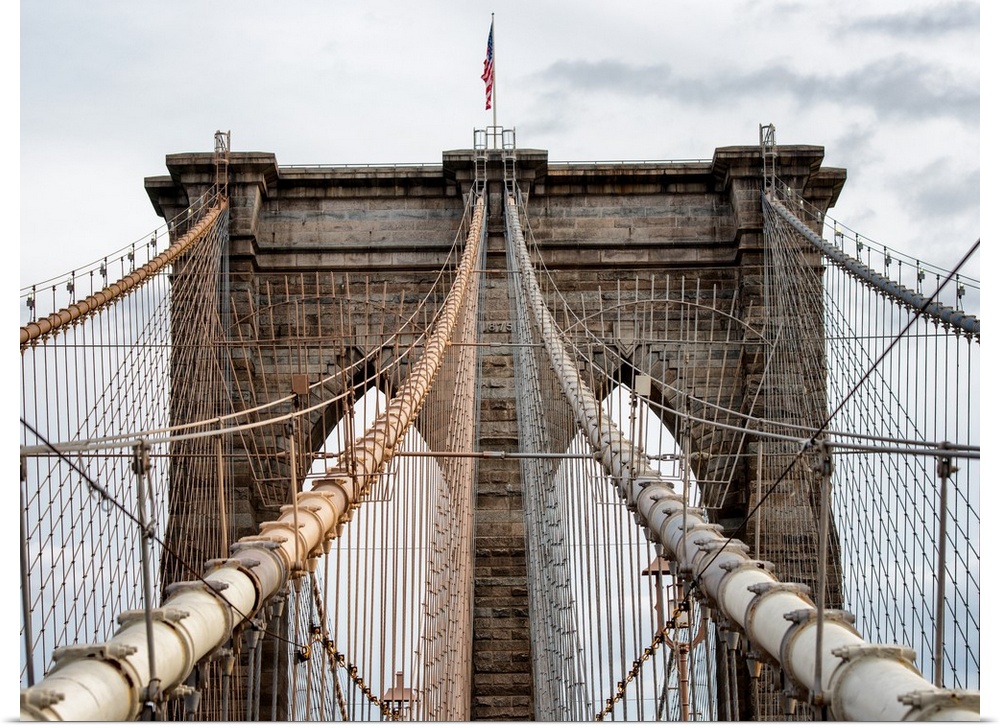 A photograph of the Brooklyn bridge upper section.