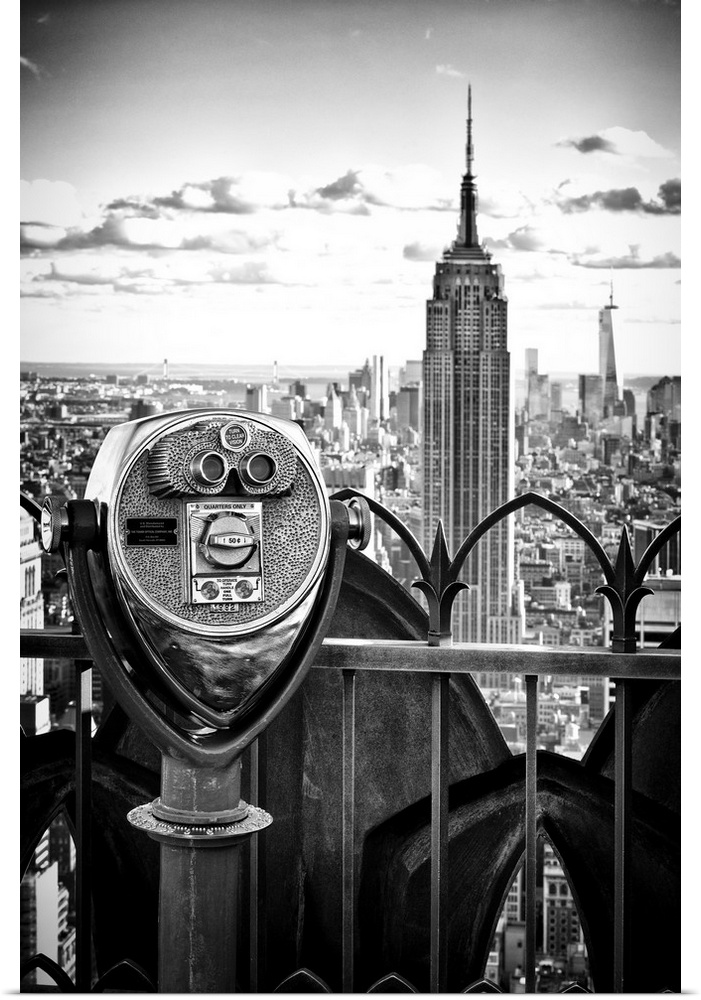 Fine art photo of coin operated binoculars on the observatory of a building, with the Empire State Building in the distance.