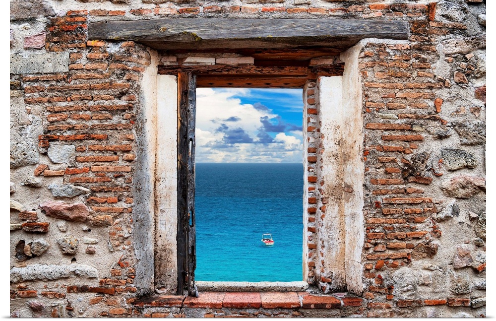 View of a clear blue ocean with a boat framed through a stony, brick window. From the Viva Mexico Window View.