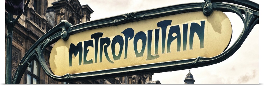 Sign for an entrance to a Paris Metro station, or subway.