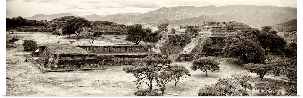Sepia panoramic photograph of the pyramid of Monte Alban in Oaxaca, Mexico. From the Viva Mexico Panoramic Collection.