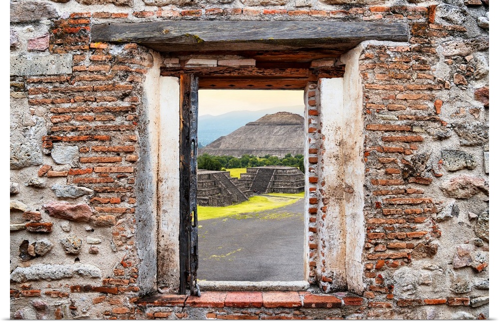 View of the Teotihuacan Pyramids framed through a stony, brick window. From the Viva Mexico Window View.