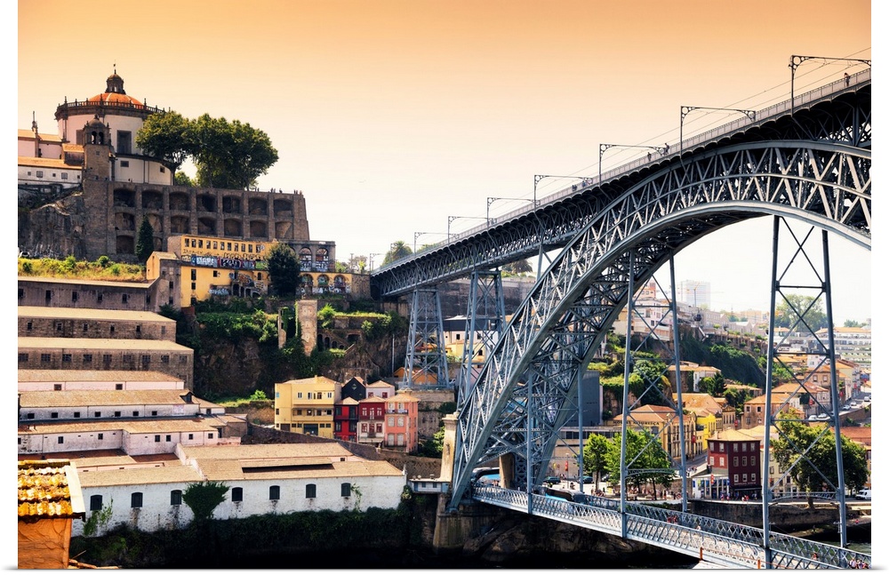 It's a landscape picture at sunset of the city of Porto (Portugal) with the Dom Luis bridge.