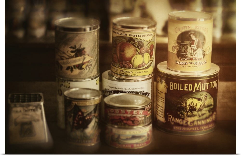 A collection of tin cans of various foodstuffs.