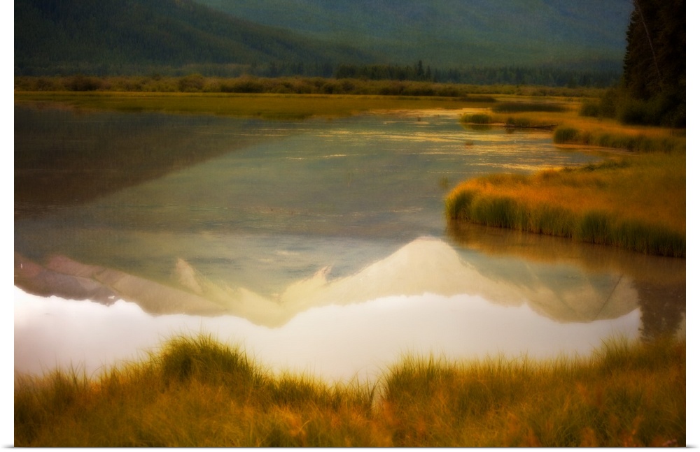 A photograph of a mountain reflection in a lake with a distressed overlay to the photo.