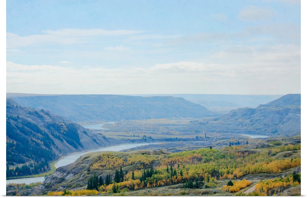 A photo of a scenic view of a river valley during fall.