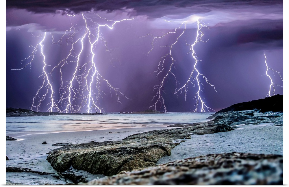 Multiple lightning strikes over the ocean near Denmark, Western Australia.